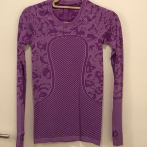 Never worn.  Long sleeve top.